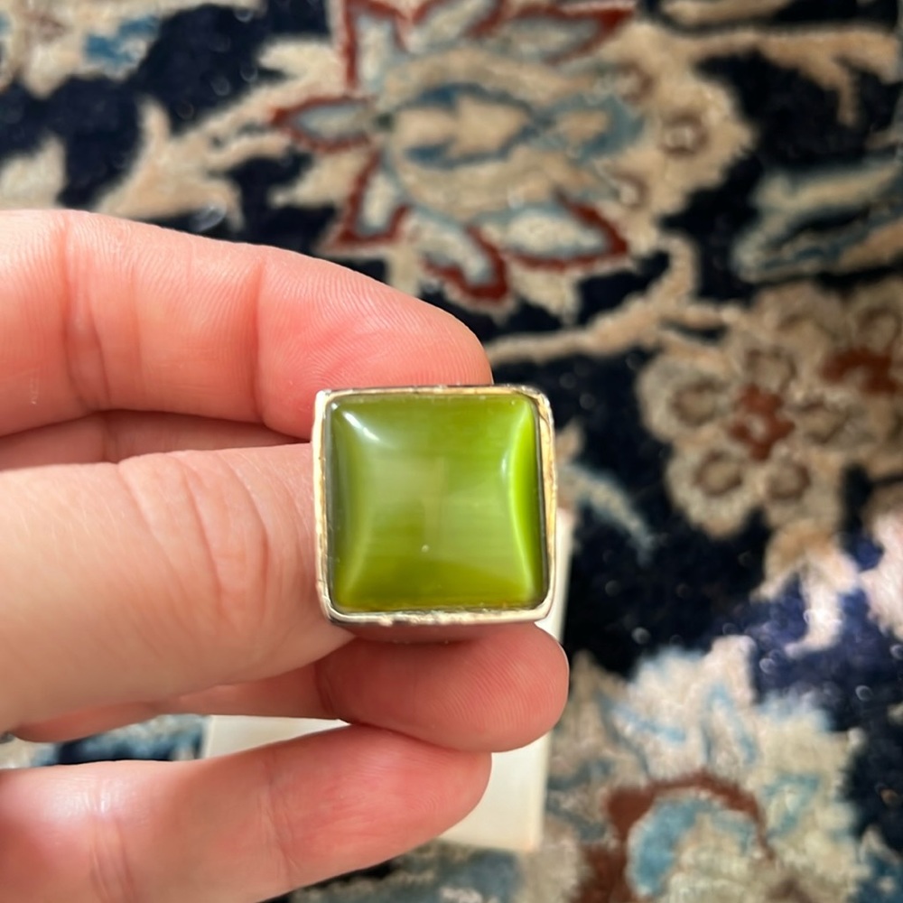 Green costume jewelry ring. Nice heavy quality.